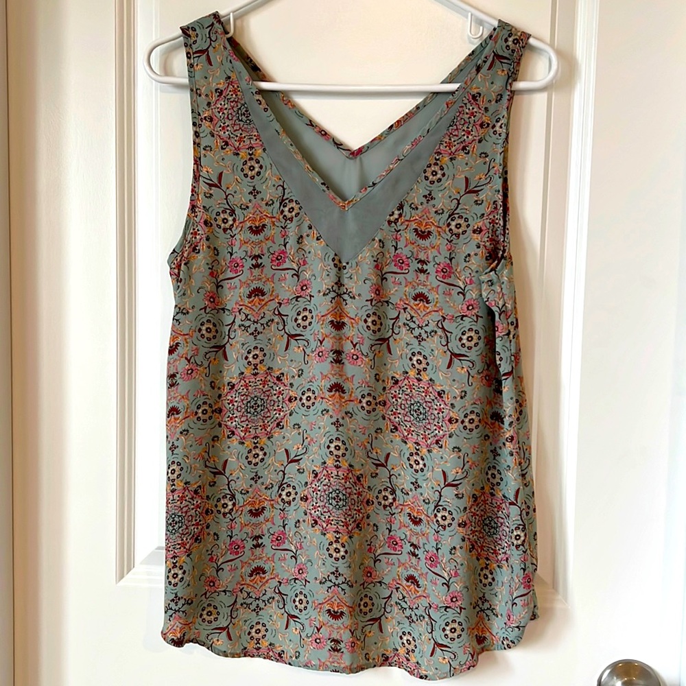 Maurice’s tank size M.  Blue-ish green with henna and flowers